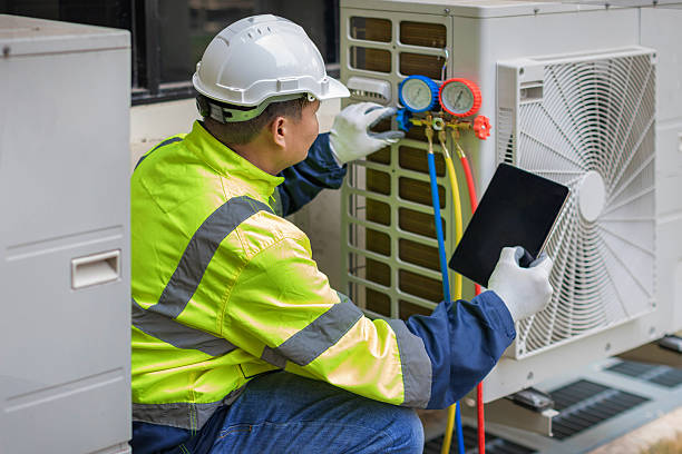 Professional Air Duct Cleaning technician working in Winsted, MN